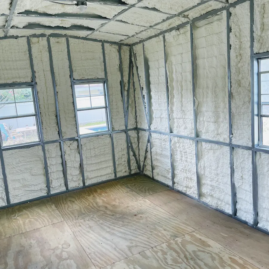 Closed-cell spray foam insulation applied to wall cavities in a residential project in Pocahontas